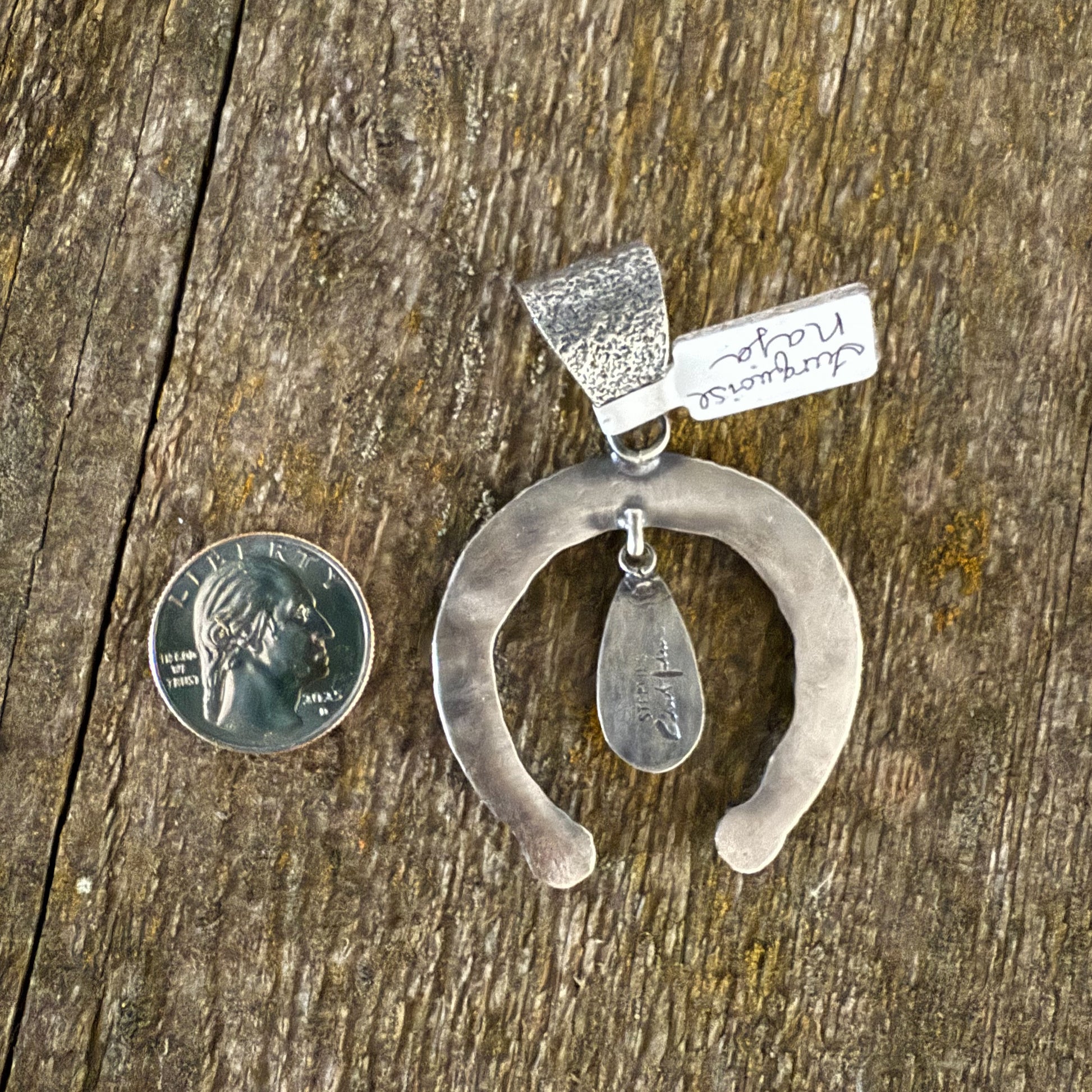 Authentic Native American Hand Cast Sterling Silver and Black Jack Nadja Pendant.