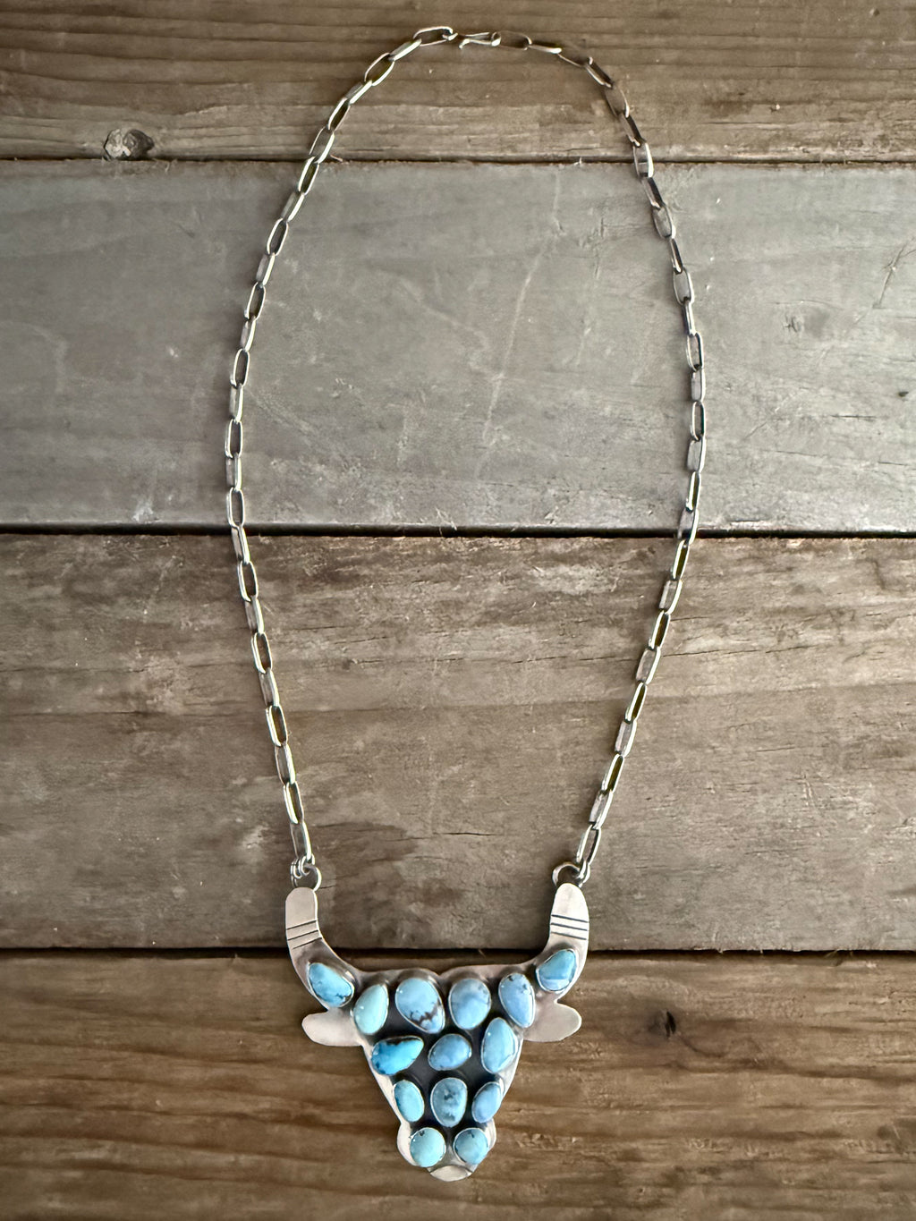 Authentic Native American Handmade Sterling Silver and Golden Hills Paper Clip Cow Necklace.
