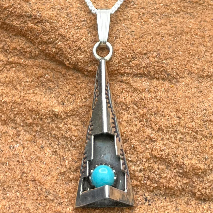 Authentic Native American Handmade Cut and Stamped Sterling Silver and Turquoise Pendant with 18” sterling silver chain necklace.