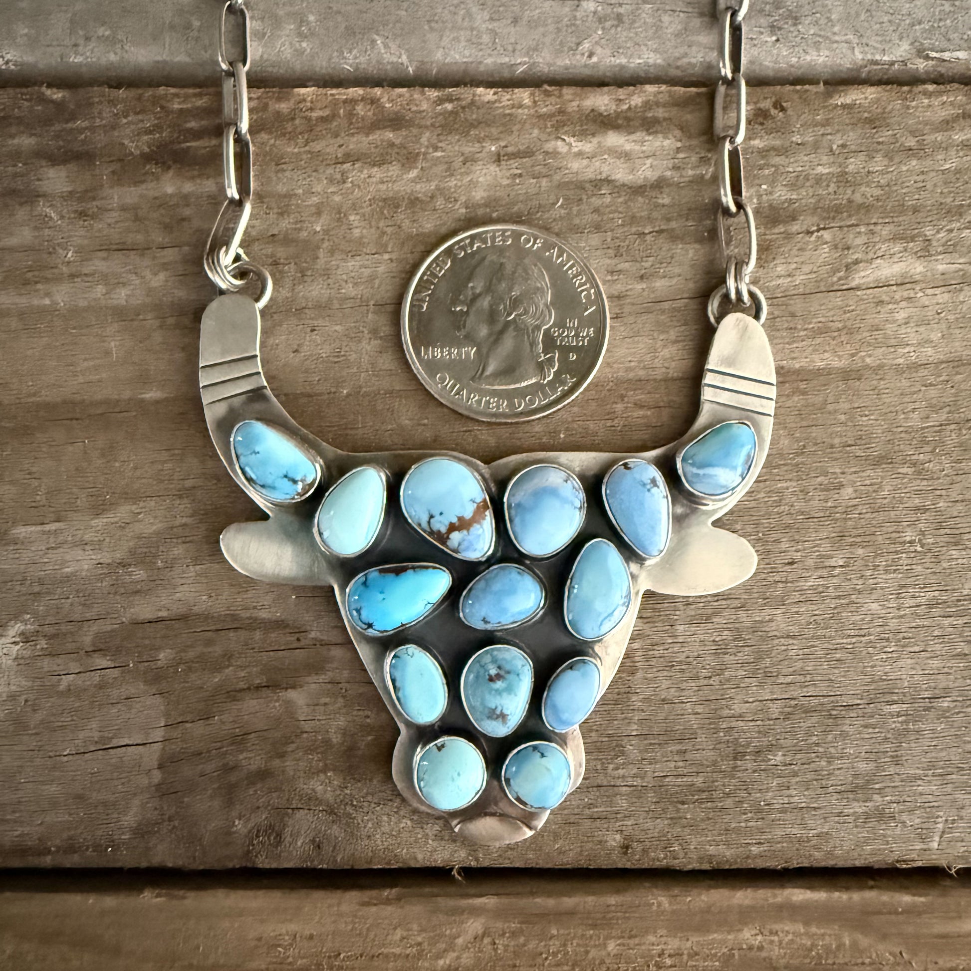 Authentic Native American Handmade Sterling Silver and Golden Hills Paper Clip Cow Necklace.