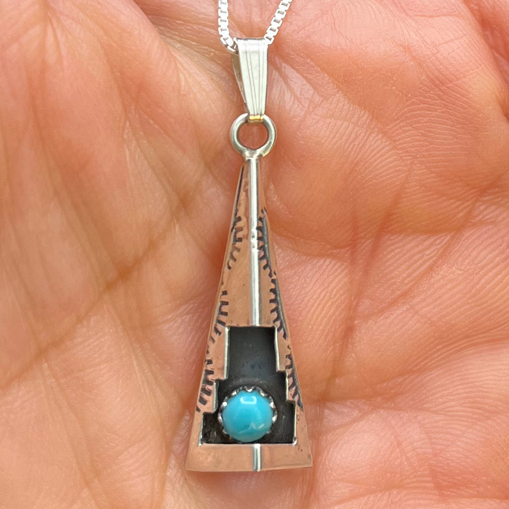 Authentic Native American Handmade Cut and Stamped Sterling Silver and Turquoise Pendant with 18” sterling silver chain necklace.