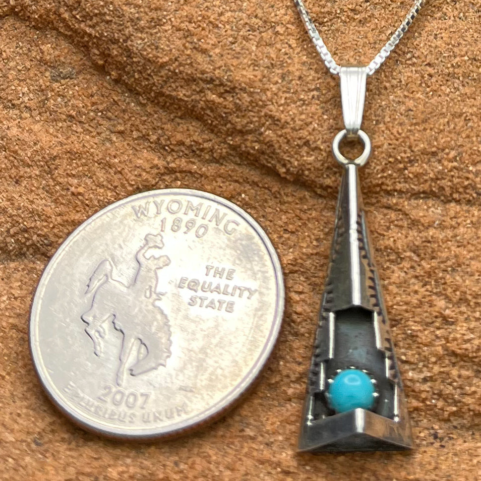 Authentic Native American Handmade Cut and Stamped Sterling Silver and Turquoise Pendant with 18” sterling silver chain necklace.
