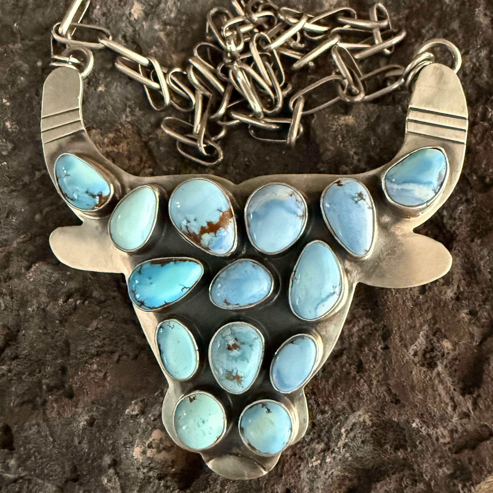 Authentic Native American Handmade Sterling Silver and Golden Hills Paper Clip Cow Necklace.