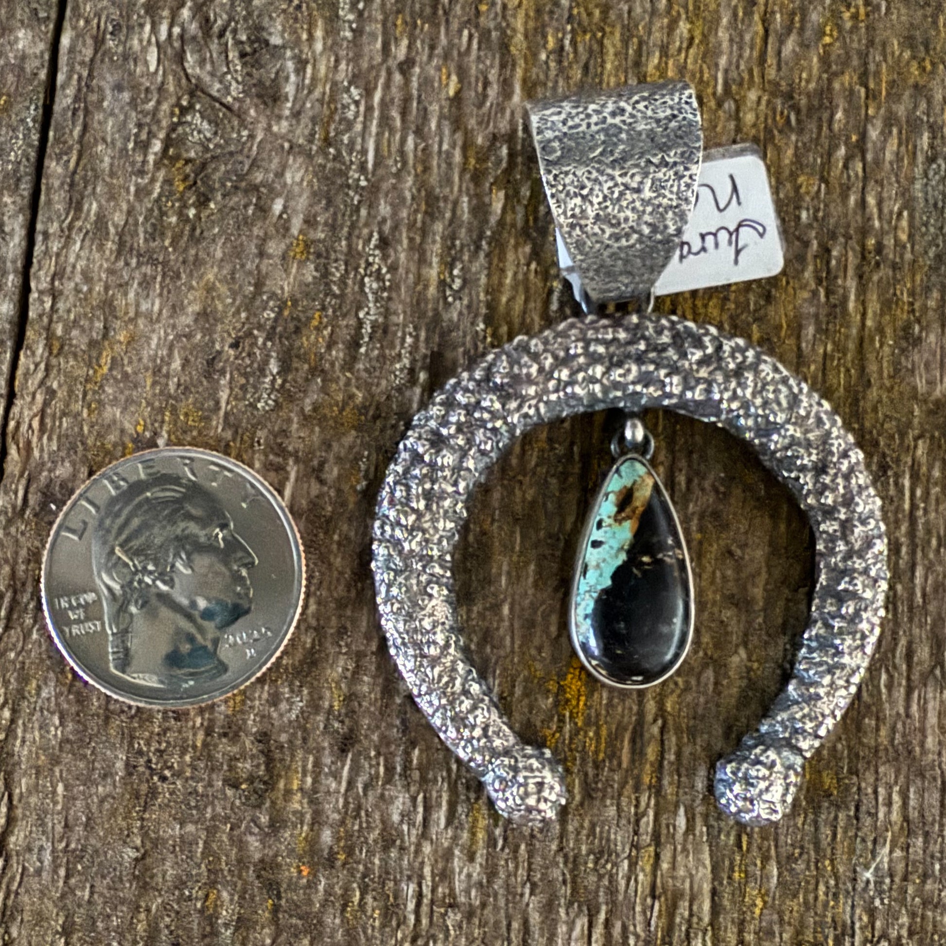 Authentic Native American Hand Cast Sterling Silver and Black Jack Nadja Pendant.