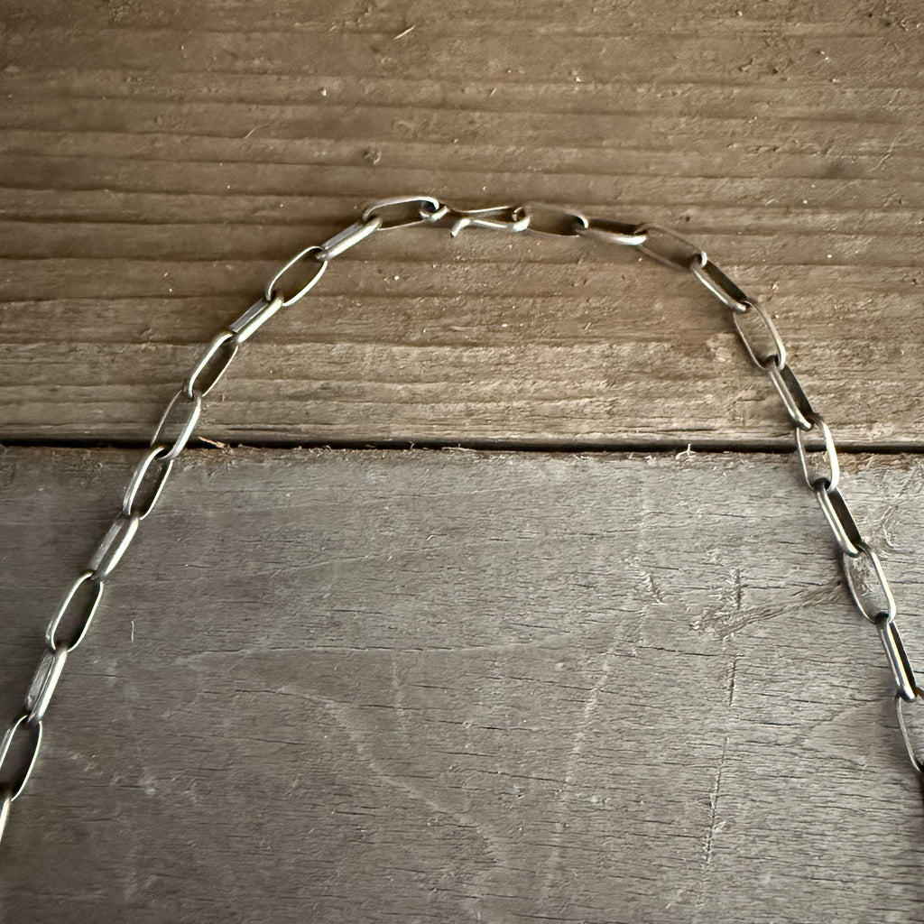 Authentic Native American Handmade Sterling Silver and Golden Hills Paper Clip Cow Necklace.